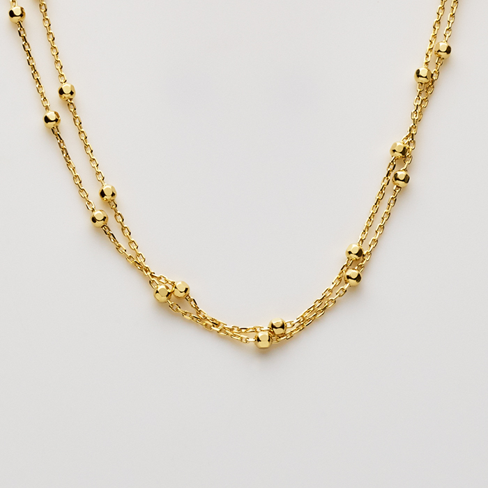 Dobbel ankelkæde i forgyldt sølv med små kugler - Guld & Sølv Design 8884/F